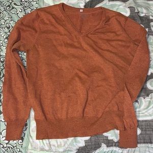 Seven pumpkin colored sweater